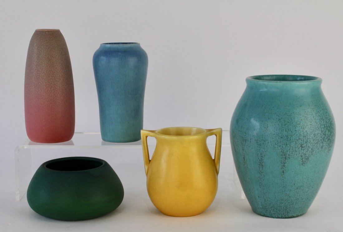 5 Rookwood Pottery Vases: 5 production pieces; 1927 blue 7.5" vase, 1927 yellow 4.5" vase with angular handles, 1923 blue 6" vase, 1922 red to gray vase, 1905 green mat 3" squat vase, all in original condition.