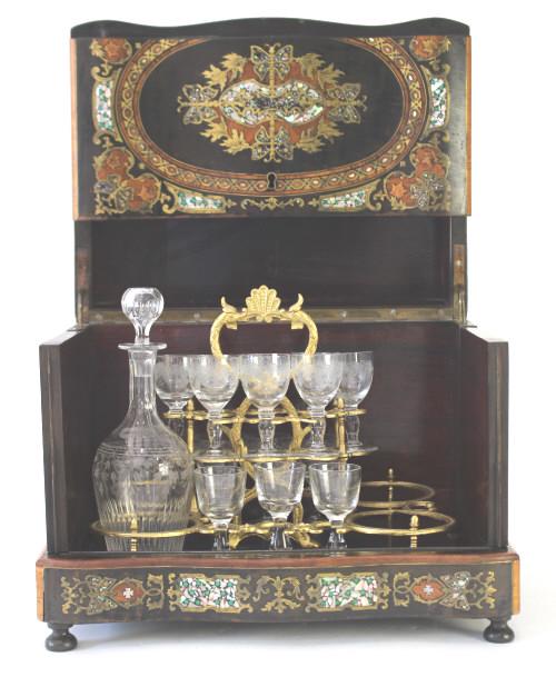 19th C. Boulle Inlaid Tantalus: splendid abalone, brass and burl wood inlay on ebony case, satinwood inlay edged, rosewood veneer interior, cast brass cordial and bottle holder, 11-1.5 oz grape border etched cordials, 3- plain cordi