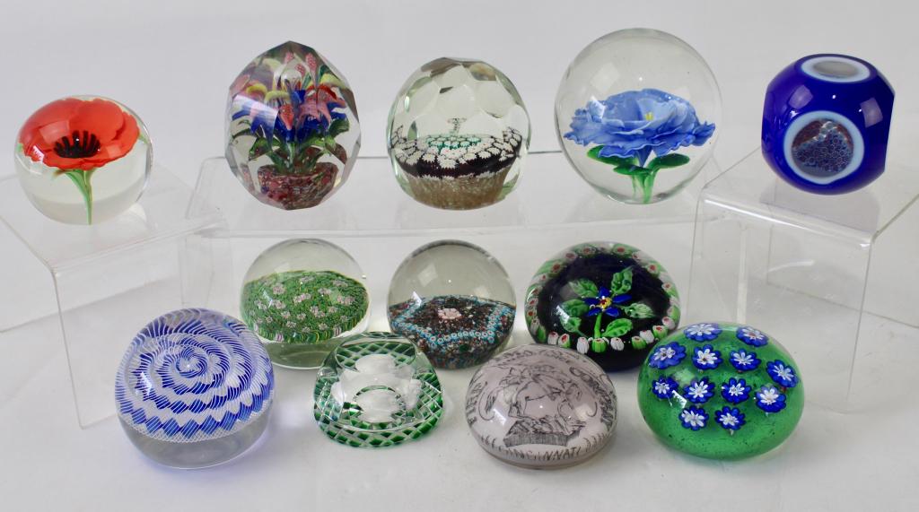 Collection of Twelve Paperweights: includes examples of Orient & Flume, Baccarat, Kennedy, Sulfide, Amazon Ins. Co. Advertising Cincinnati, other examples attributed to Caithness, Perthshire, Strathearn, Clichy and P. Ysart, all in goo
