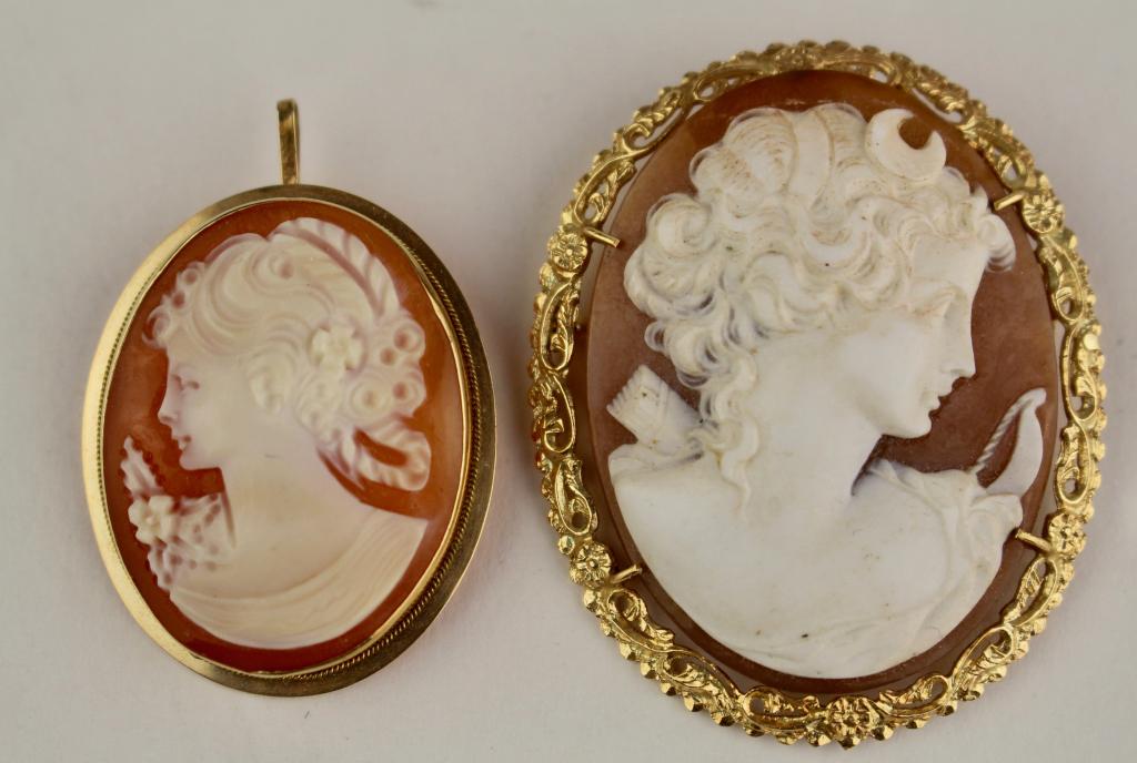 Two Shell Carved Cameo Brooches: smaller 14K yellow gold marked "Italy", the larger 18K yellow gold, assuredly Victorian and signed 2" x 1.5", both in pristine condition.
