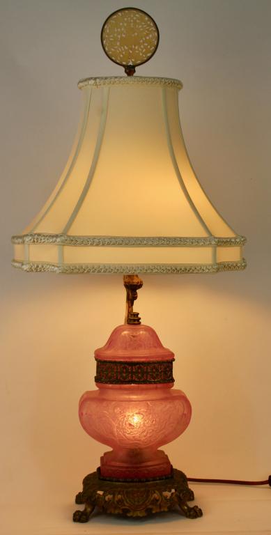 Steuben by Frederick Carder Lamp: extremely rare etched rose quartz table lamp, covered urn shape #8431, with Oriental motif, brass open work factory base with dragon figural post, double pull chain socket with interior light, carved 