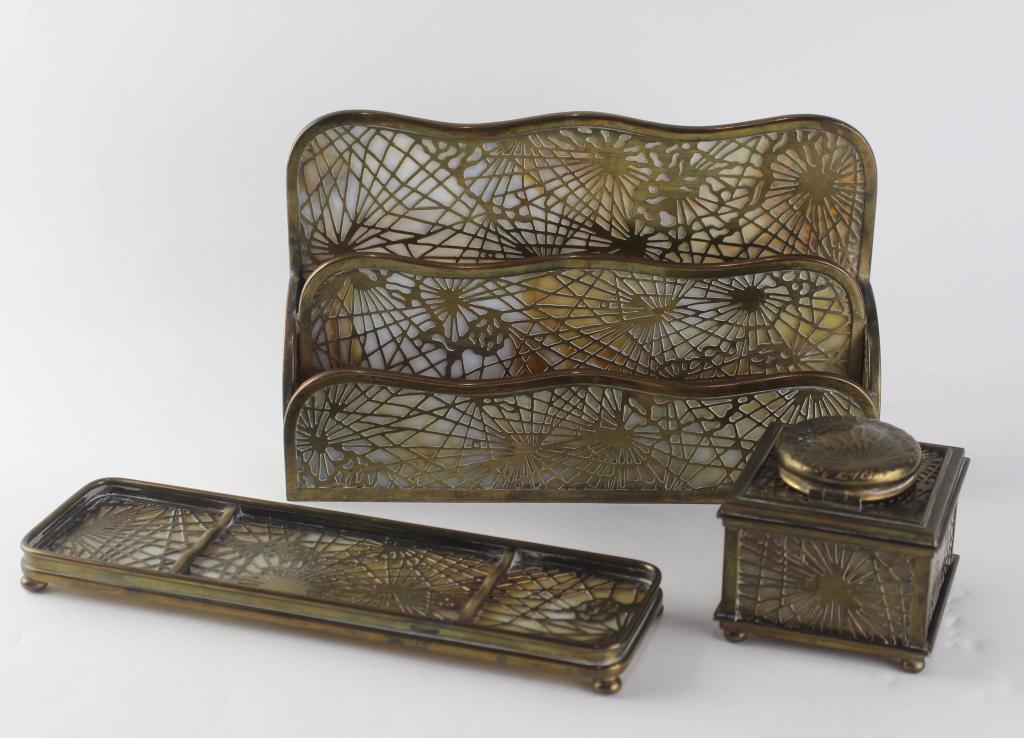 Tiffany Studios Pine Needle Desk Accessories: 3 pieces including letter holder #1008, inkwell #845 and pen tray #1004, all signed, all good condition.