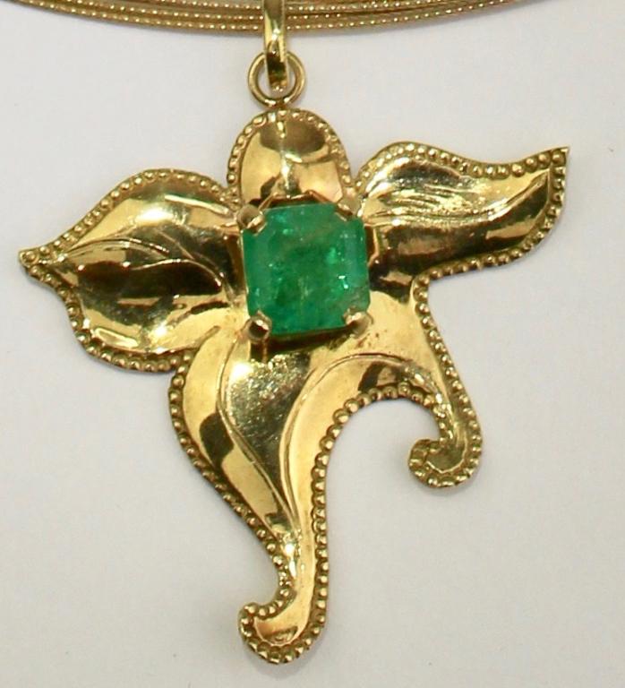 Emerald & 18K Starfish Necklace: 1.79 ct. emerald, tone 3, sat 5, 6.8 grams total weight, 1.5" x 1 3/8".