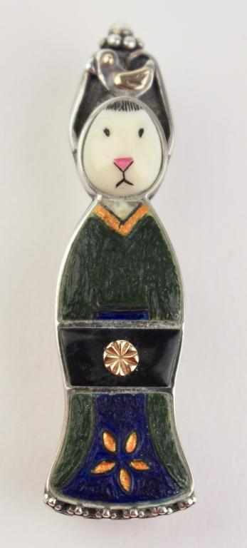 Michelle Tapia, Sante Fe, Geisha Bunny: custom line of jewelry, pendant - pin of 14K gold and sterling, scrimshaw fossilized walrus, signed with original bill of sale 2010. 2.25" long.