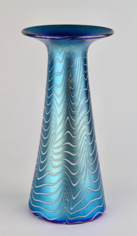Durand Art Glass Vase "KIng Tut": electric blue iridescence with interspersed wavy white lines, tapering top to bottom with flared opening, perfect, unsigned, 7.25" tall.