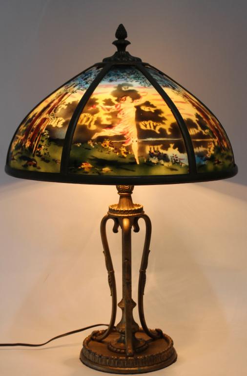 Reverse Painted 6 Panel Lamp: c. 1925, scenes show thinly veiled nude running through colorful landscape. Shade has chipped ice effect and in very good condition, no maker's name but our research concludes this was a limited line 