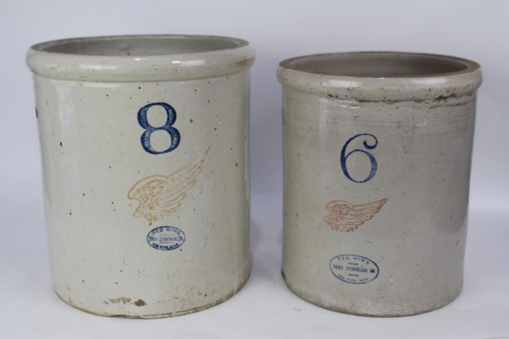 2 Red Wing Stoneware Crocks: #6 and #8, both in fair to good condition.