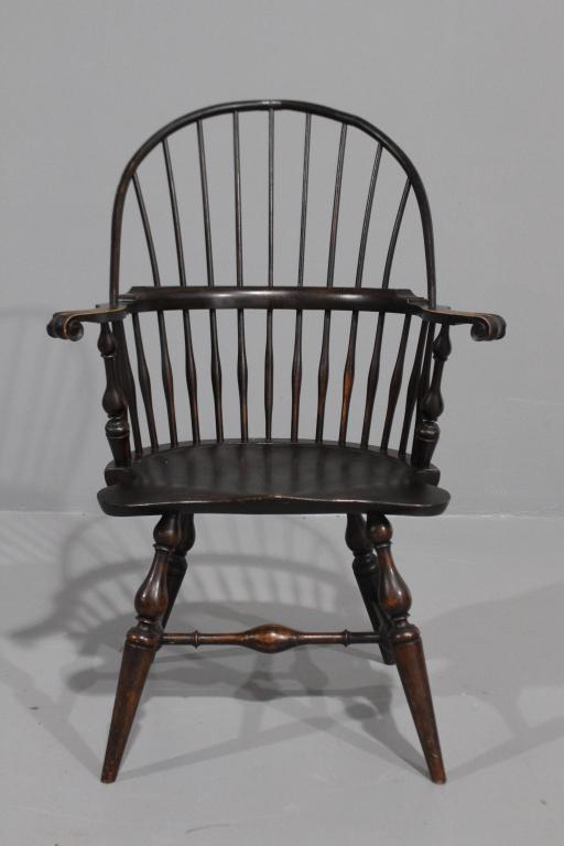 Wallace Nutting Windsor Bow Back Armchair: No. 408, spindled back, formed seat, scrolled arms, turned stretcher and legs, old professional repair to crest, edge chip on one scroll, 41" x 27" x 18". Beautiful original finish.
