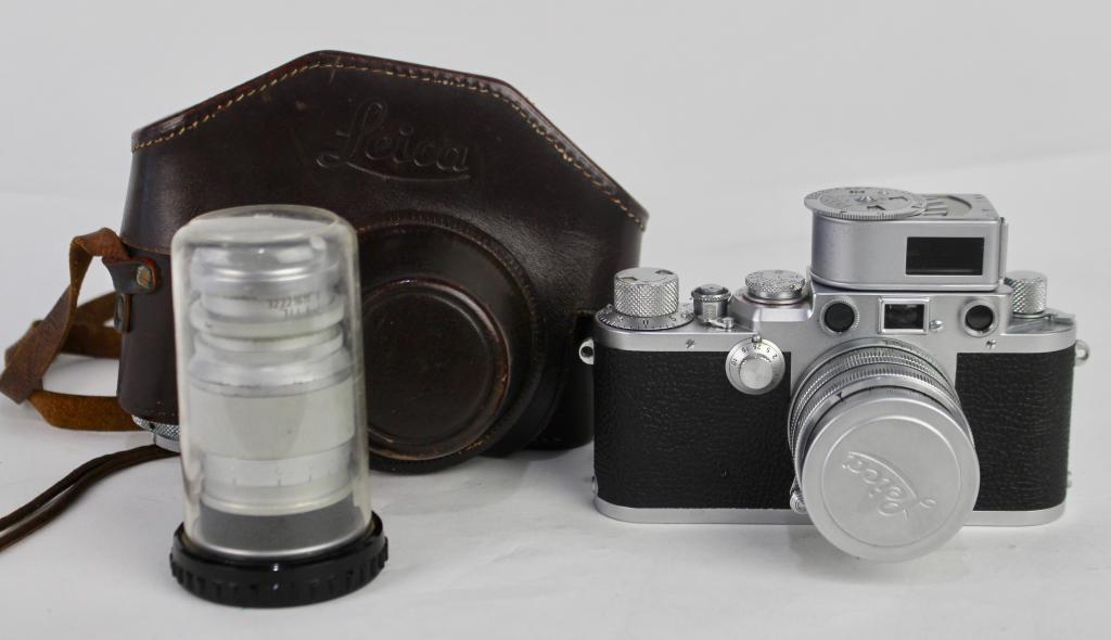 Leica DRP Camera, No. 630935: Ernst Leitz Wetzlar, Germany. This camera comes with an Ernst Leit Gmbtt Wetzlar lens, Summarit f=5cm 1:15, Number 1000161, and an Elmar f-9cm 1:4 lens, no. 719179, and a Metraphot light meter attachm