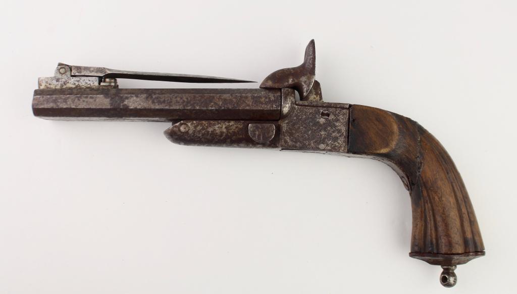 Spanish Pin Fire Double Barrel Pistol: spring out bayonet, triggers drop down when cocked, engraving on some areas, original walnut fluted grip with lanyard ring, 4.75" barrel, locking 4" bayonet, used by both sides in Civil War, fair cond