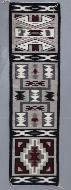 Navajo Runner, 21" x 76": c. 1980, the Teec Nos Pos tradition, three distinct images and designs, very good condition.