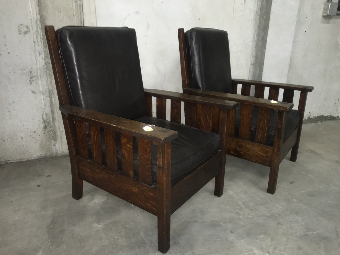 Pair Gustav Stickley Fixed Back Arm Chair #324: Pair Gustav Stickley Fixed Back Arm chair, #324. Circa 1907. Fixed back arm chair with slats to the seat rail and corbels under the arms and brown leather cushions. Very good overall condition.