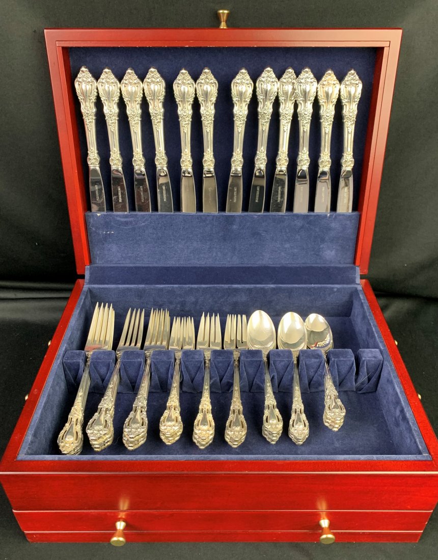 Eloquence by Lunt - Sterling Silver Flatware 61.5 OZT: Eloquence by Lunt - Sterling Silver Flatware 51 pcs. Box measures 5 5/8" x 14 1/2" x 11". 61.5 troy oz. Total weight of boxed flatware is 13.5 lbs. Serves 12 with butter knife, large serving fork and 