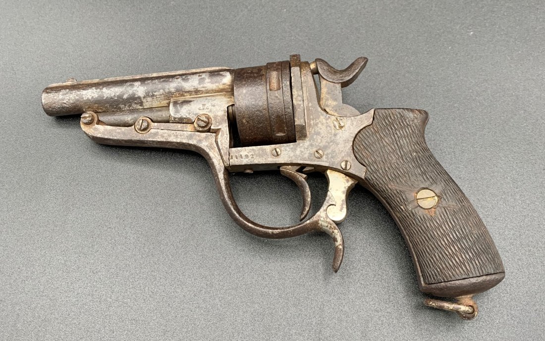 Belgian Pinfire Cavalry Pistol Caliber 9mm: Belgian Pinfire Cavalry Pistol Caliber 9mm. Originally designed by Charles Francois Galand, naming it Schimdt-Galand. Serial number 11192. Gun is 6" long. Grip is 3 1/2" long. Overall condition is goo