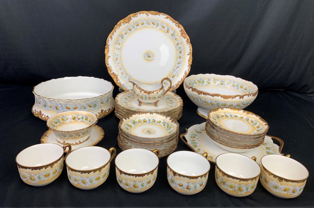 T/V Limoges Porcelain Hand Painted Dinner Set - France: T/V Limoges Porcelain Hand Painted Dinner Set (29 total pieces) - France. Hand painted Daisy design with gold trim. (5) - 8 1/2" plates. (12) - 6" saucers. (6) - 3" cups. (1) - 10" platter with handle
