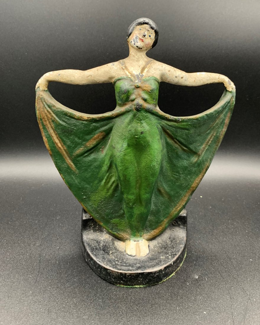 Art Deco Cast Iron Doorstop "Woman in Gown": Art Deco Cast Iron Doorstop "Woman in Gown. Measurements are 9" x 7 1/4" x 3 1/2" & weight is 9 lb. In good condition.