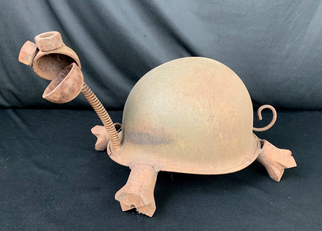 Trench Art Army Helmet Turtle By Conlon - Sculpture: Trench Art Army Helmet Turtle By Fred Conlon folk art sculpture. Made from reclaimed WWII army helmet. Measures 8" x 9" x 18". Handmade and signed by artist. Overall condition is very good.