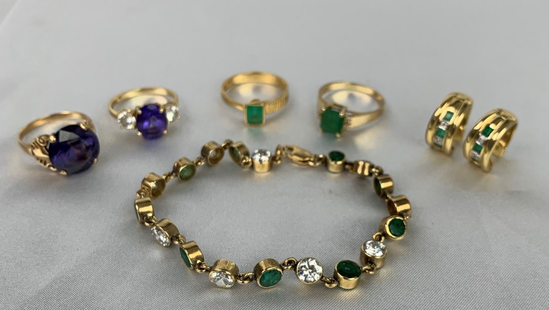 14K & 18K Gold - Diamond - Emerald Jewelry Lot: 14K & 18K Gold - Diamond - Emerald Jewelry Lot. Bracelet is 7" long. Earrings are hoop about 1/2" in diameter. Ring sizes are 7 to 7.5. Total weight is 27 grams. Overall good condition.