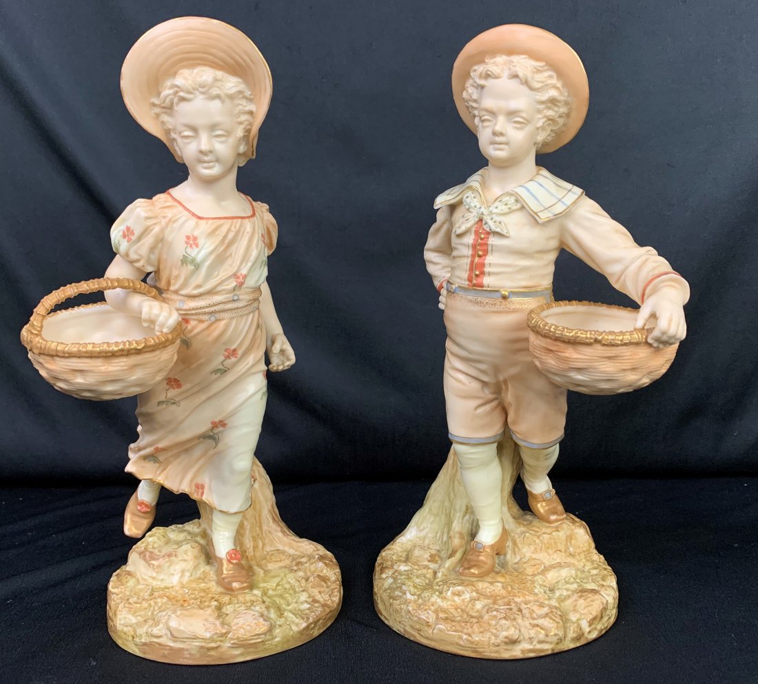Royal Worcester Pair of Figurines "Hadley": Royal Worcester Pair of Figurines "Hadley". Porcelain pair of figurines. Boy and girl carrying baskets. Signed by Hadley and stamped on the bottom. Boy has a chip on the back of his hat. Boy measures 