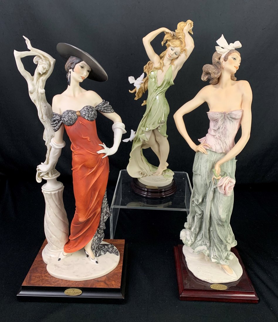 3 Giuseppe Armani Figurines - Aurora, Alessandra +: 3 Giuseppe Armani Figurines. Alessandra "Ragazza con Rosa". Boxed 7 1/2" x 22" x 10". Sculpture is 18 3/4" x 5 5/8" x 5 1/4". limited edition 823-5000. Aurora "Ragazza con Colombe". Boxed 7 1/2" x 22"