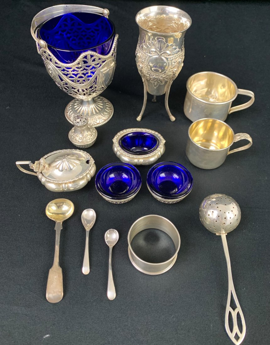 Estate Sterling Lot - 14 Pieces: Estate Sterling Lot - 14 Pieces. Total weight is 16.32 troy oz. Tallest is 5" and smallest is 1 1/2". Small creamer lid is separated from the base. Overall condition is good.