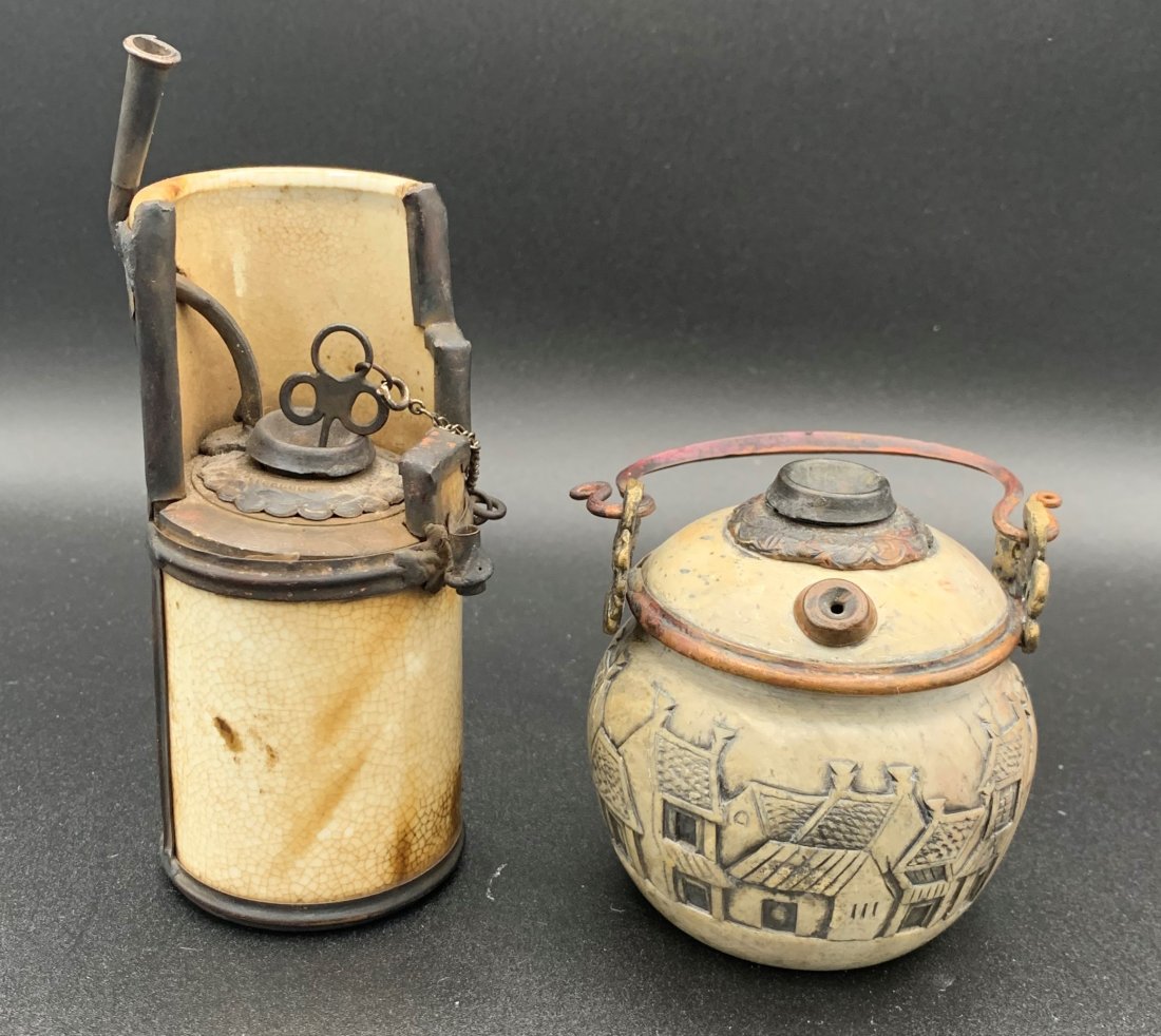 2 Chinese Porcelain Opium Water Pipes: 2 Chinese Porcelain Opium Water Pipes. Tall pipe is 5" tall and 2" wide. Shorter pipe with handle is 3.5" tall and 3" wide. Good condition.