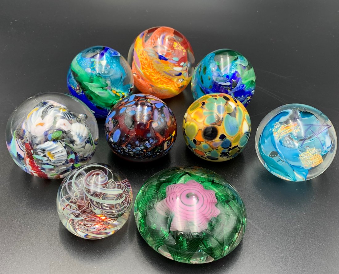 9 Paperweights Jim Karg,J. Byron, Trout Studios, Hat: 9 Paperweights signed by artist on the bottom. (3)- Jim Karg, (2)- J. Byron, (1)- Trout Studios, (1)- Hat & (2) with illegible signature. Tallest measures 3" tall. Shortest is 1 1/2" tall. In good con