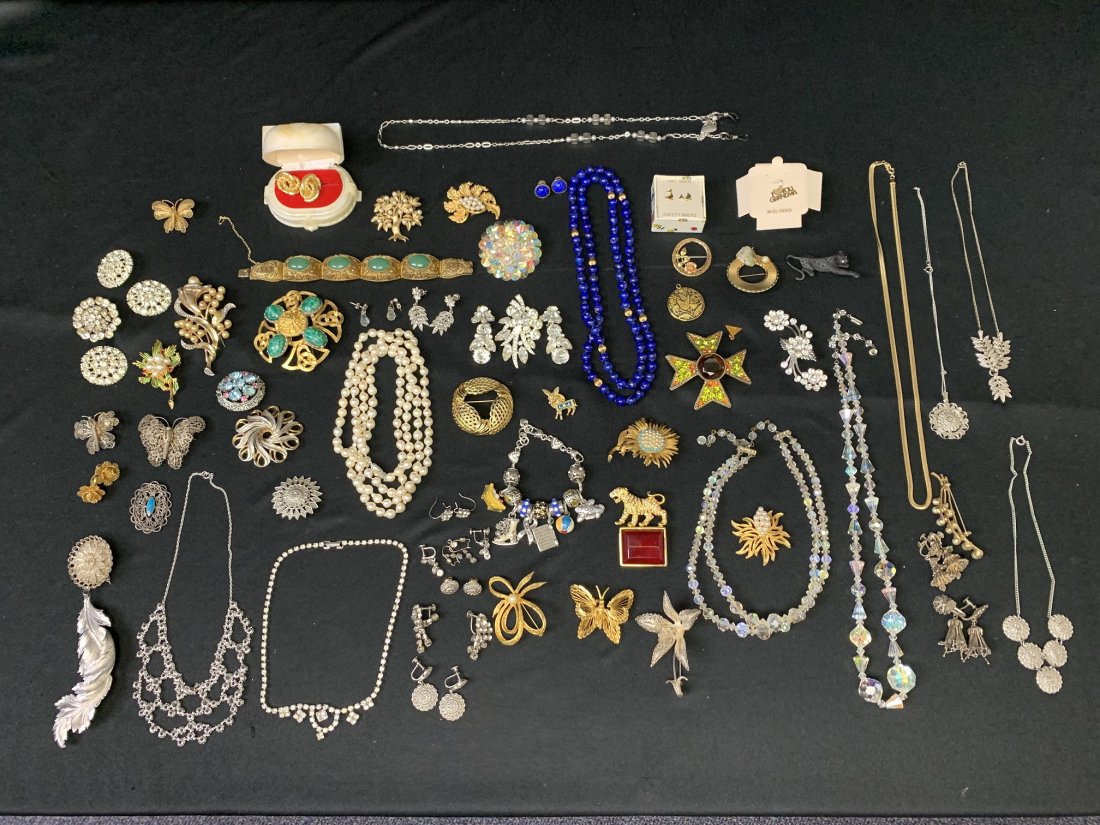 Estate Lot of Gold, Silver, Pearl & Costume Jewelry: Estate Lot of Gold, Silver, Pearl & Costume Jewelry. (1) Trafari chain & pin, (1) set of "Eisenberg" earring and pendant, (1) set of Lapis 14K earring and necklace, 14K dolphin earring and "I love you