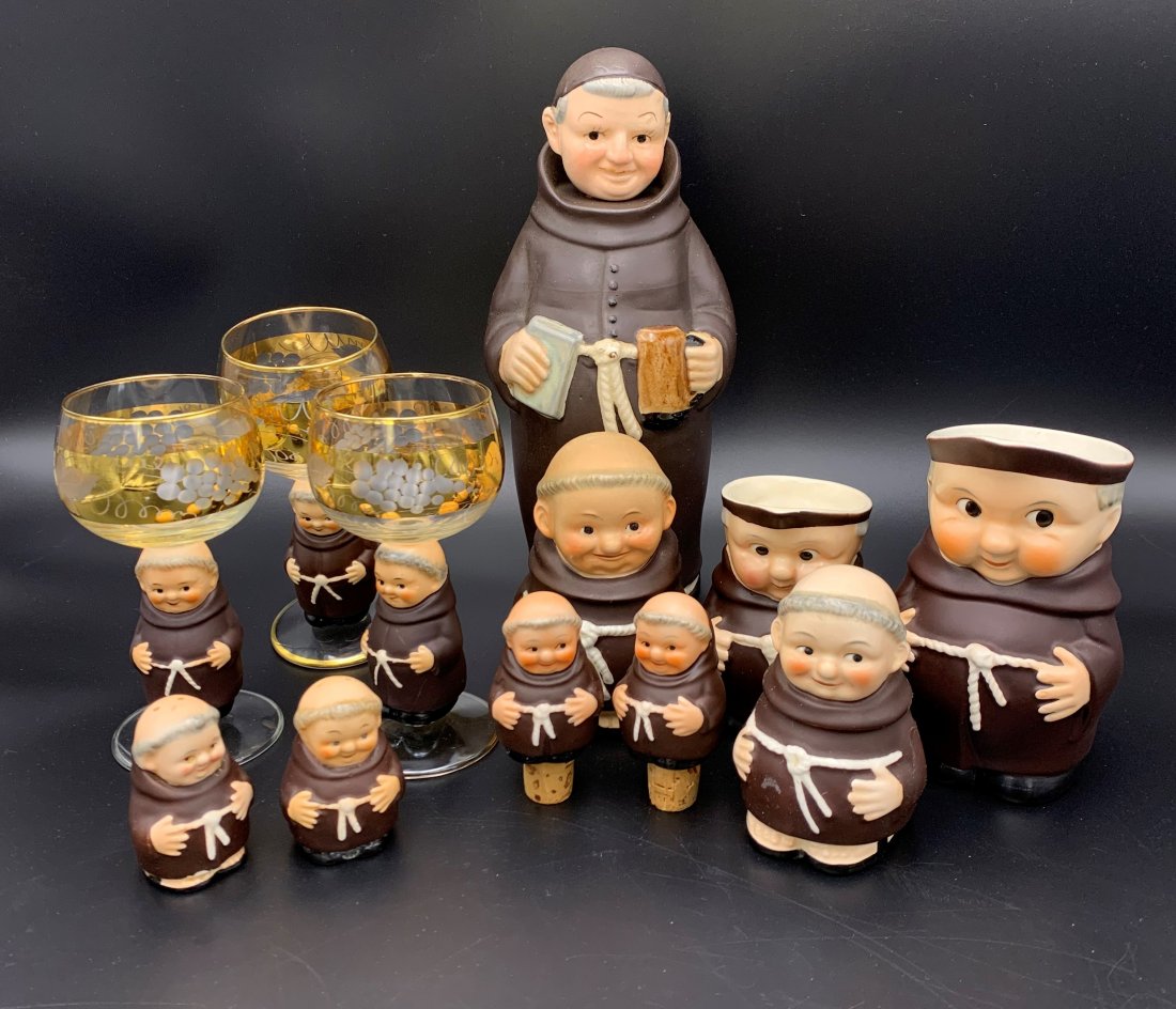 12 pcs of Hummel Friar Tuck "Monk": 12 pcs of Hummel Friar Tuck. Friar Tuck Monk decanter is 9 1/2" tall. (3) monk wine glass 5 1/2" tall, set of monk salt & pepper 2 1/2", (2) monk creamer pitcher , one is 5 1/2" tall and one is 4" tal