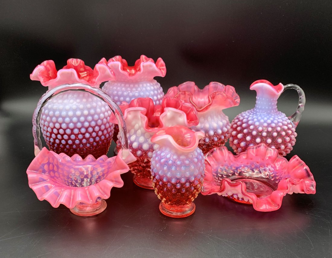 Fenton Cranberry Hobnail Ruffled Collection 8 Pcs.: Fenton Cranberry Hobnail Ruffled Collection 8 Pcs. The two larger vases are 6" tall and 4" in diameter. The two medium vases are 4 1/2" tall and 4" in diameter, one vase has a small crack, see photos.