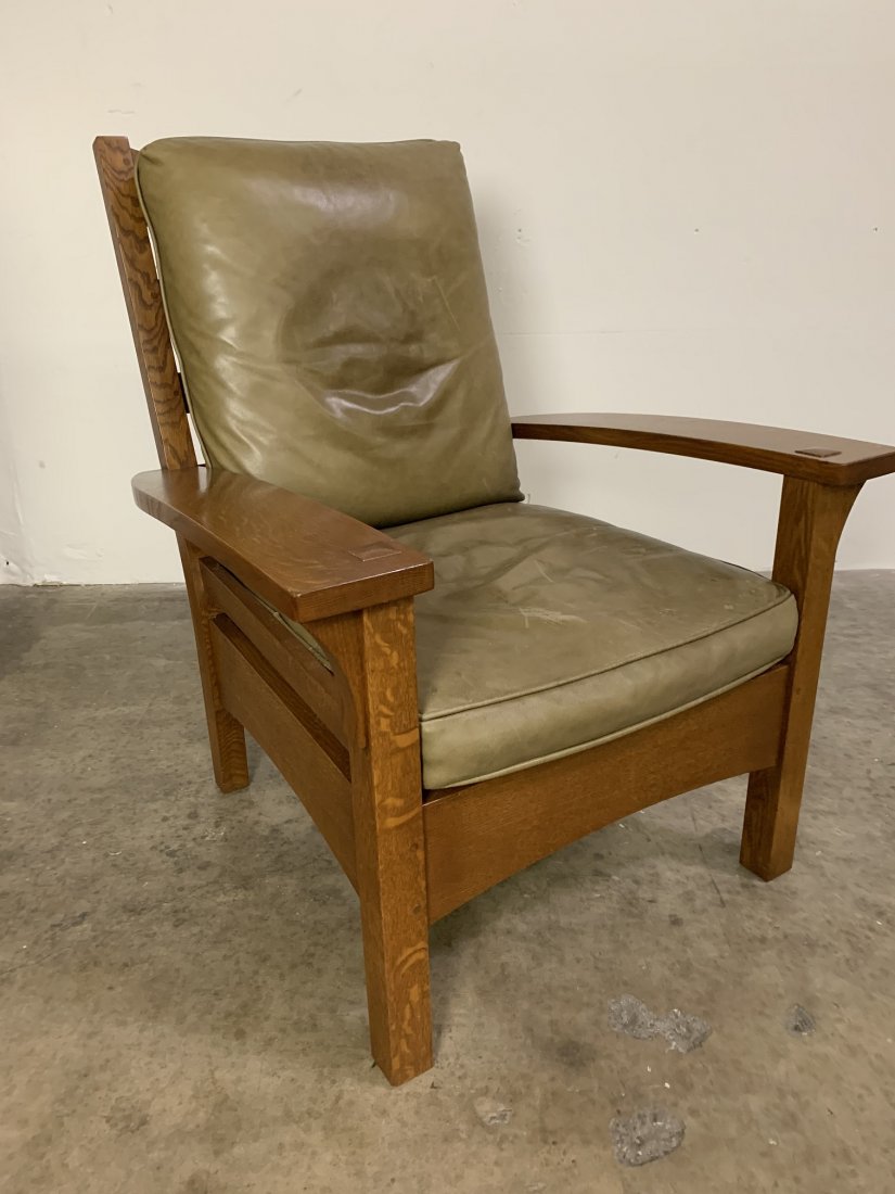 Stickley Fixed Arm Morris Chair - Arts & Crafts Style: Stickley Fixed Arm Morris Chair. Stickley fixed arm oak chair with removable leather cushions. Chair measure 39" tall x 29 1/2" wide x 31 1/2" deep. Leather cushions show some discoloration. Overall i