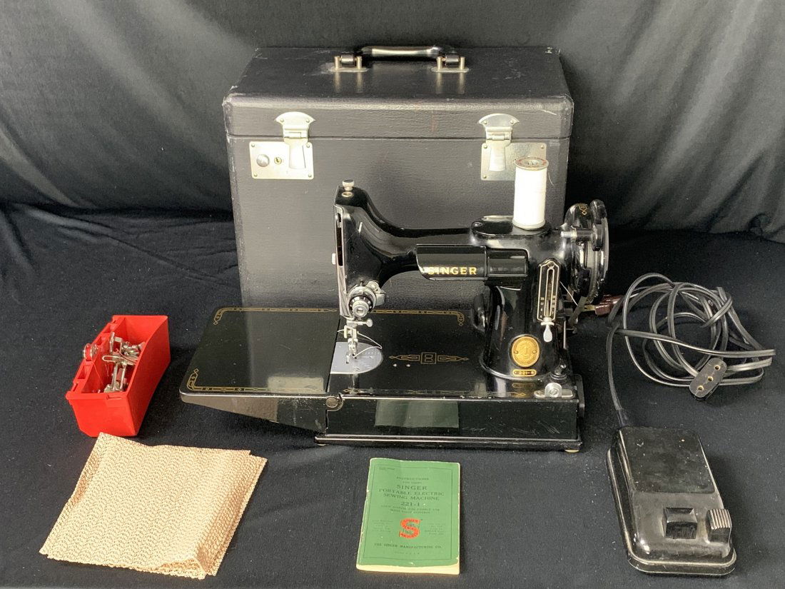 Singer Featherweight Sewing Machine Model #221-1: Singer Featherweight Sewing Machine Model #221-1. Serial number AM663928 MODEL #221-1. Manufactured in Elizabethport, New Jersey, USA. Singer machine comes with electronic foot controller, 6 sewing ac
