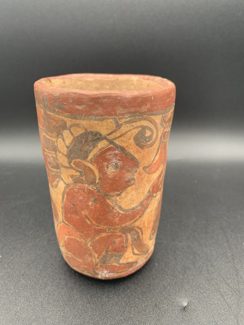Pre-Columbian Mayan Pottery Drinking Cup: Pre-Columbian Mayan Pottery Drinking Cup. Measure 4 5/8" tall x 3" wide. In good condition.