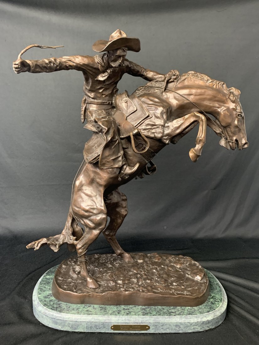 Bronco Buster By Frederic Remington Bronze Statue: Bronco Buster By Frederic Remington Bronze Statue. Measure 22" tall x 17 1/2" wide x 9 3/4" deep & weight: 55lb. In excellent condition.