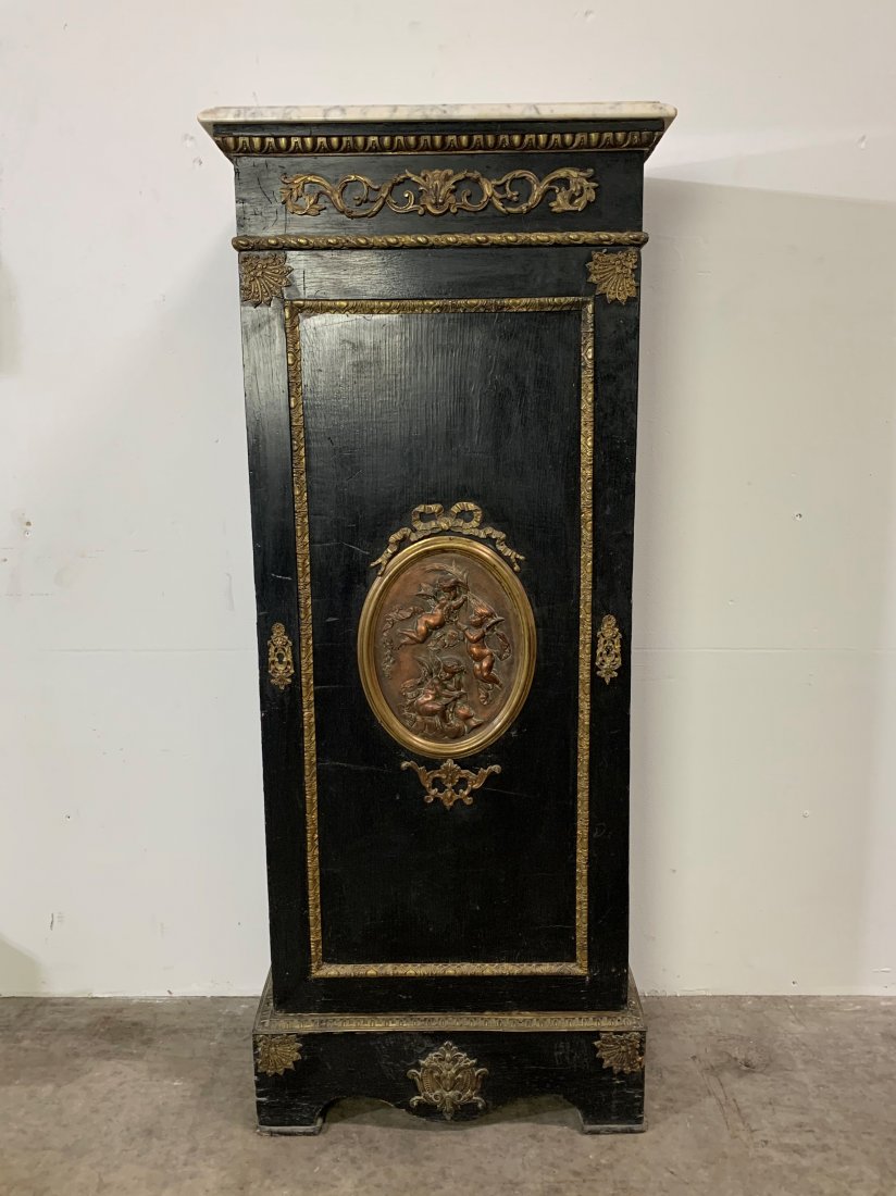 Ebonized French Cabinet, Helene Bertaux Bronze Plaque: Ebonized French Cabinet, Helene Bertaux Bronze Plaque with marble top. Signed M' Leon Bertaux bronze plaque depicting 2 putti in flight over 1 reading. Cabinet measures 53" tall x 22" wide x 14 1/2" d