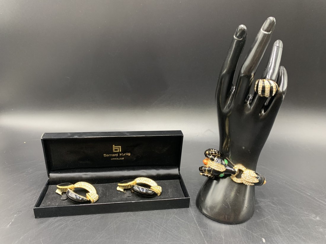 Vintage Ciner Ram Head Bangle, Earing & Ring: Vintage Ciner Enameled Ram head Bangle, Earing & Ring. The ring is a size 7 ring, clip-on earring measure 60mm & Ram head is 34.8 mm. Please refer to pictures. The ring is missing a stone. In good con