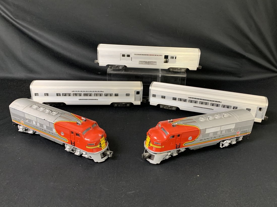 Santa Fe Lionel Diesel Locomotive & Aluminum Cars: Vintage Santa Fe Lionel Diesel Locomotive & Aluminum Cars. (1) Diesel locomotive No.2342, (1) Diesel locomotive No. 2343, (1) aluminum baggage car No. 2530, (1) aluminum passenger car No.2533 & (1) al