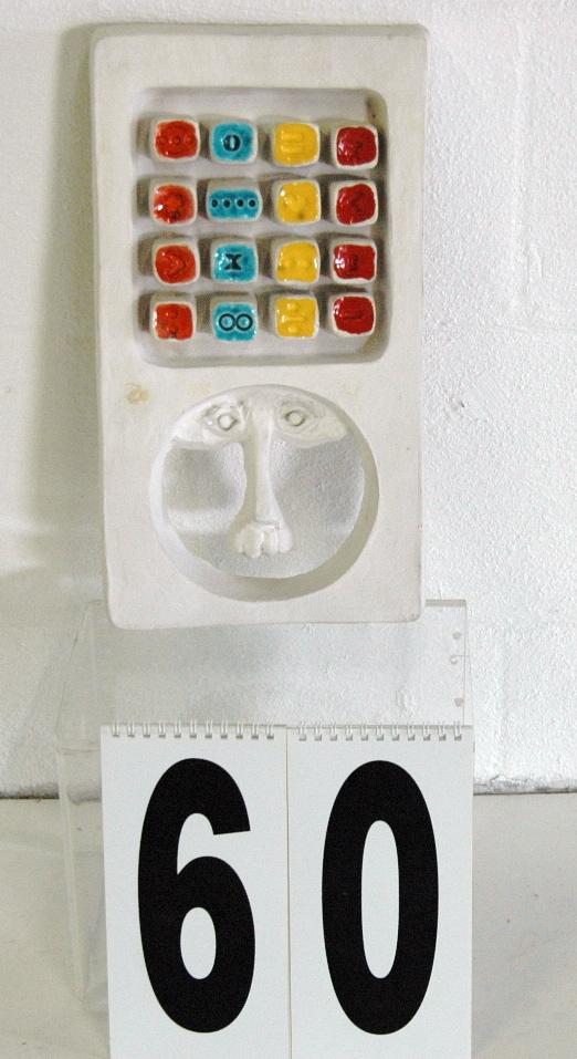 BENNINGTON POTTERY SCULPTURE: C 1965 SIGNED BENNINGTON POTTERY, FLOATING FACE WALL, SIGNED DG (DAVID GIL) SOLID PLASTER WITH PRIMARY ENAMEL COLORS, 8 X 13.