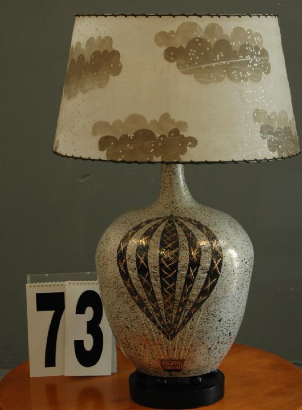 "HOT AIR BALLOON" LAMP: CERAMIC HOT AIR BALLOON TABLE LAMP W/ ORIGINAL CLOUDS DESIGNED SHADE, 33H.