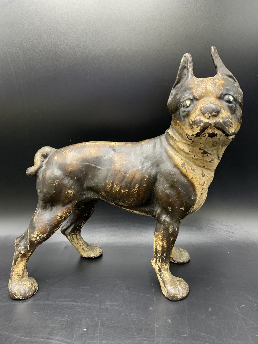 Old Cast Iron Doorstop "Boston Terrier" Original Paint: Old Cast Iron Doorstop "Boston Terrier" with Original Paint. The dog sculpture measures 10 1/2' tall x 9" length x 4" depth & weights: 7 lbs. In good condition.