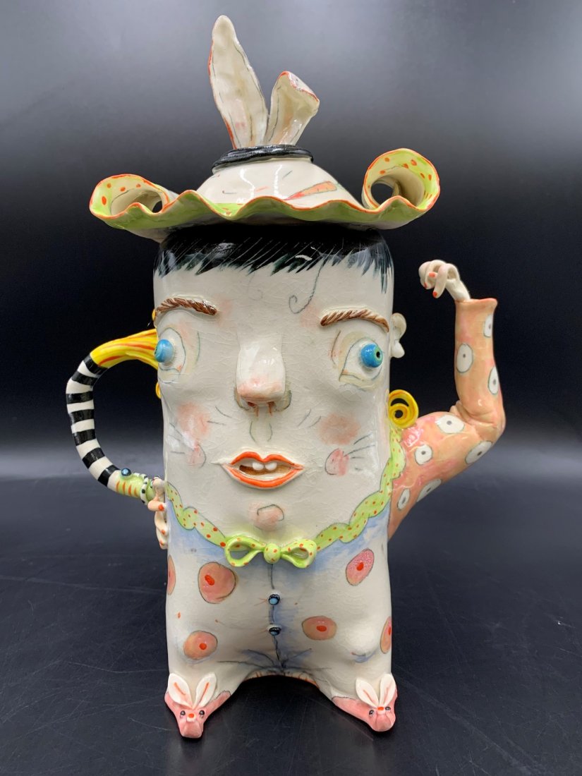 Irina Zaytceva Whimsical Porcelain Figural Teapot: Irina Zaytceva Whimsical Porcelain Figural Teapot. Initialed by artist on the back. The whimsical porcelain teapot with lid measures 11" tall x 8" wide x 4" deep. Weight: 1 lbs. 12oz. Visible crackled