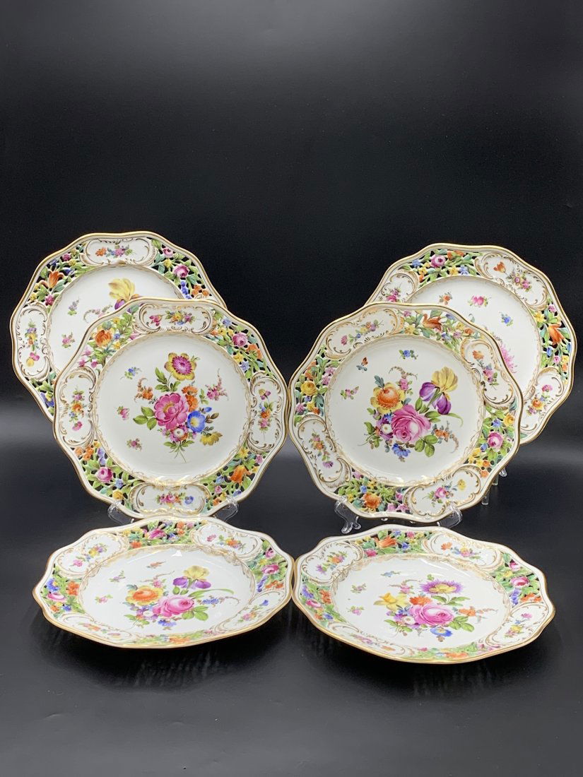 Set of 6 Dresden Hand Painted Floral Porcelain Plates: Set of 6 Dresden Hand Painted Floral Porcelain Plates. The porcelain plates are decorated with beautiful pink, purple, yellow, orange & white hand painted flower. Gold accent throughout the porcelain