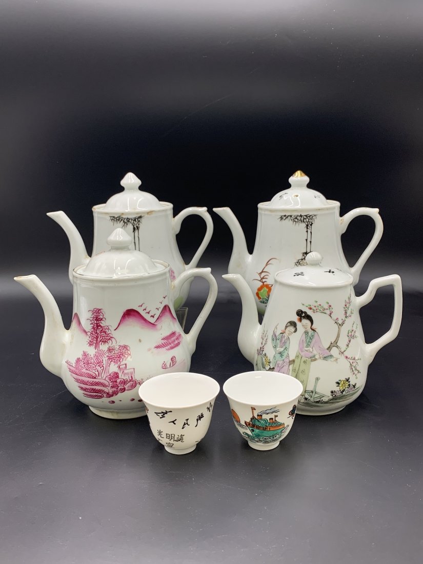 Estate Lot of Chinese Porcelain Teapots & Teacups: Estate Lot of Chinese Republic Famille Rose Porcelain Teapots & Teacups. (3) Teapots measures 7" tall x 7 1/2" wide, (1) teapot measures 6" tall x 6 1/2" wide & 2 teacups measures 2" tall x 2 1/2" wid