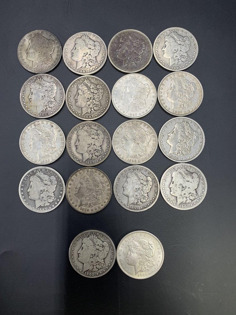 18 Morgan Silver Dollars Years 1883 through 1921: 18 Morgan Silver Dollars Year 1883 through 1921. (2) Morgan dollar year 1883, (1) Morgan dollar 1885, (3) Morgan dollar 1887, (3) Morgan dollar 1889, (2) Morgan dollar 1890, (1) Morgan dollar 1894, (2