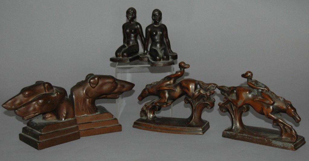 ART DECO BOOKENDS: 3 SETS OF ART DECO BOOKENDS; NUDES ON HORSEBACK BY NUART, GREYHOUND HEADS BY NUART, AND PAIR OF KNEELING NUDES, UNSIGNED, PROBABLY FRANKART.