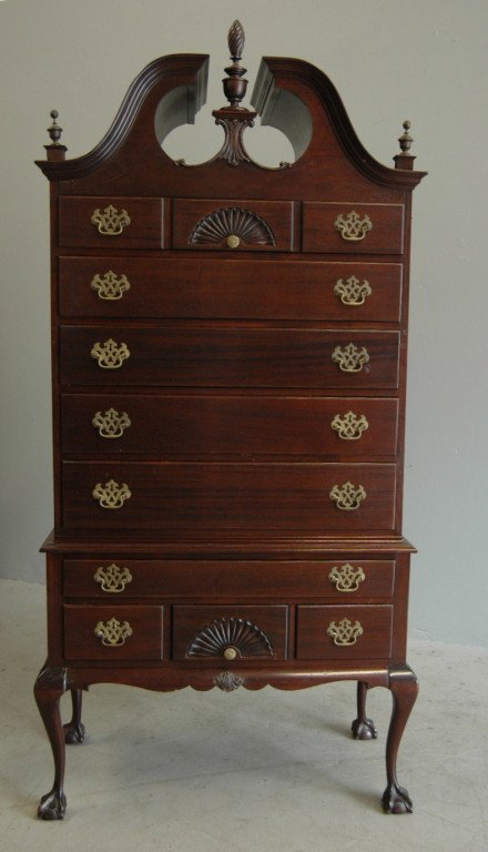 CHIPPENDALE STYLE HIGHBOY: MAHOGANY BONNET TOP CHIPPENDALE HIGHBOY BY FLINT'S FINE FURNITURE, C 1925, 39W, 81H.