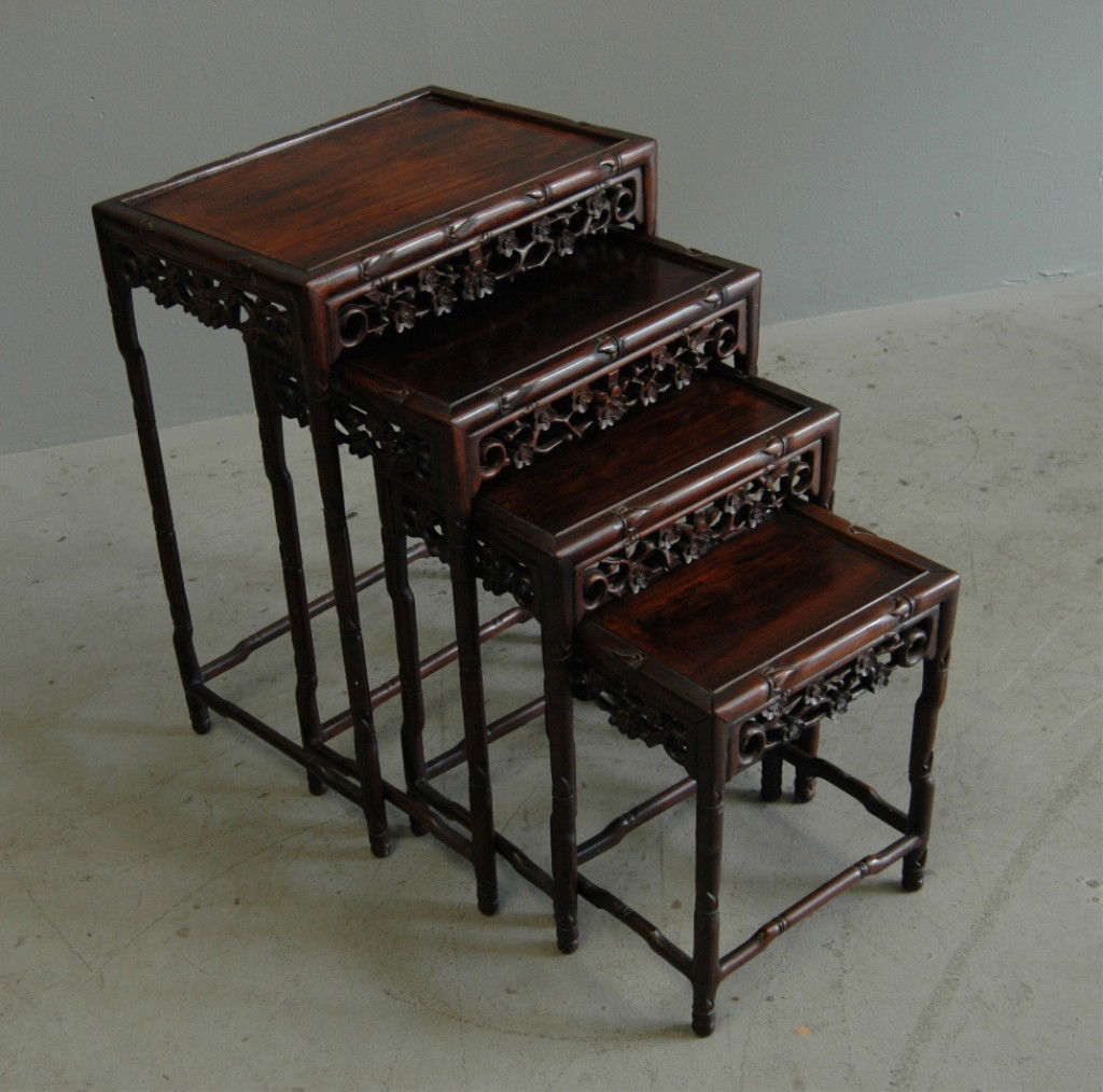 ROSEWOOD NESTING TABLES: SET OF 4 HEAVILY CARVED ORIENTAL NESTING TABLES, LARGEST 20 X 28.
