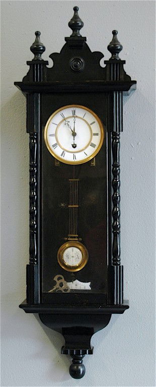 REGULATOR WALL CLOCK: EBONIZED REGULATOR WALL CLOCK, PORCELAIN FACE AND PENDULUM, TIME ONLY, 36". WORKS GREAT.