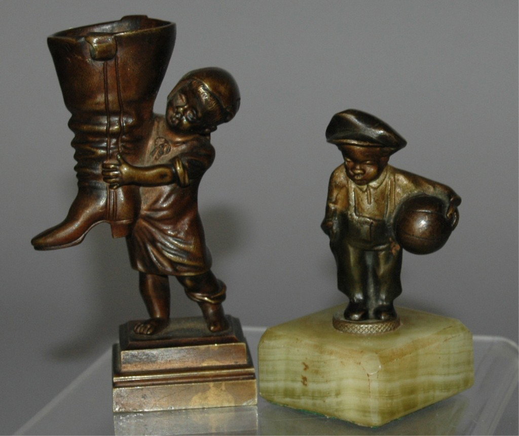 2 BRONZE MINIATURES: LITTLE BLACK BOY ON ONYX PLYNTH 4.5" AND A YOUNG BOY HOLDING GIANT BOOT IN BRONZE 3".