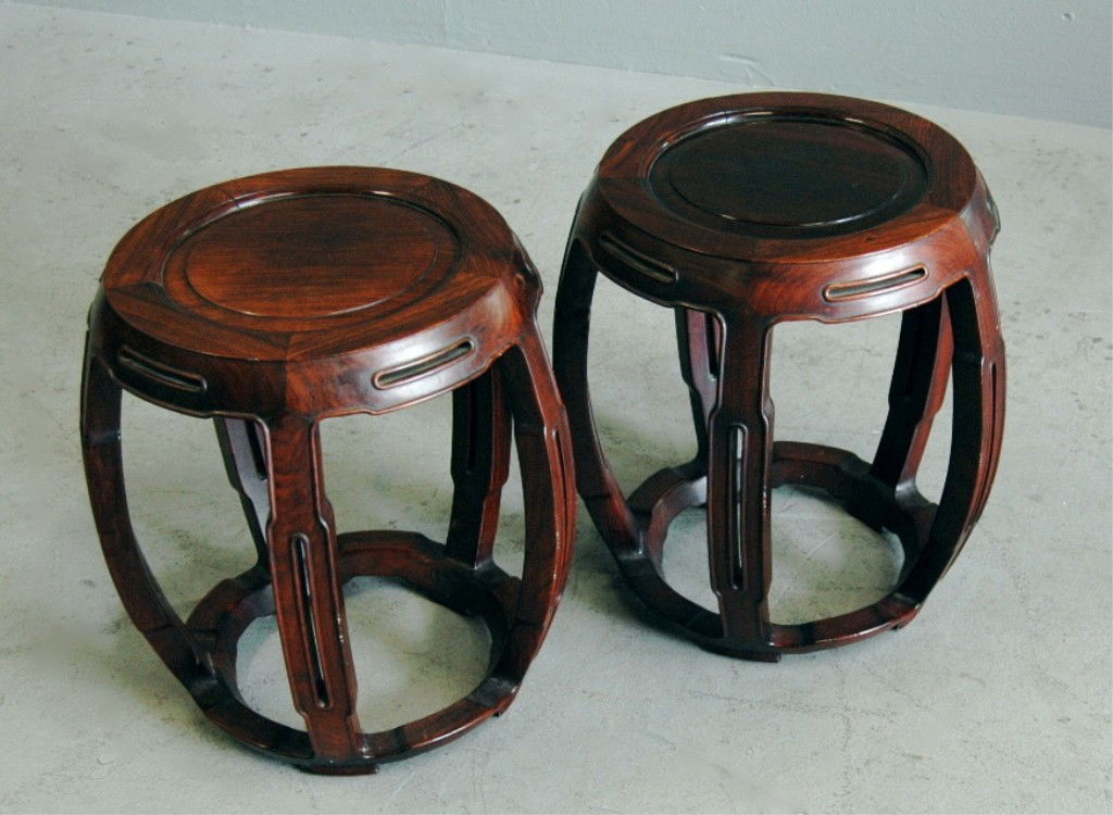 ROSEWOOD BARREL TABLES: PAIR OF CARVED ROSEWOOD BARREL SHAPED TABORET TABLES, 16"D, 18"H.